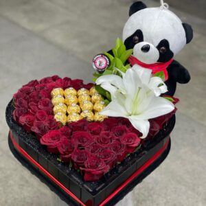 Heart box of natural red roses with Ferrero Rocher chocolates and panda plush