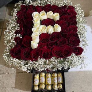 Square box of natural red roses with letter R and Ferrero Rocher chocolates