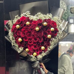 Heart bouquet of natural red roses with Ferrero Rocher chocolates