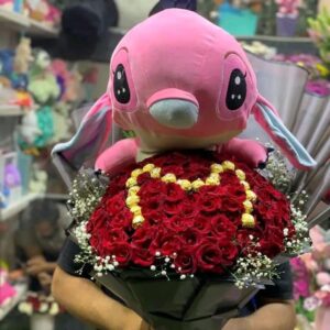 Heart bouquet of natural red roses with plush toy