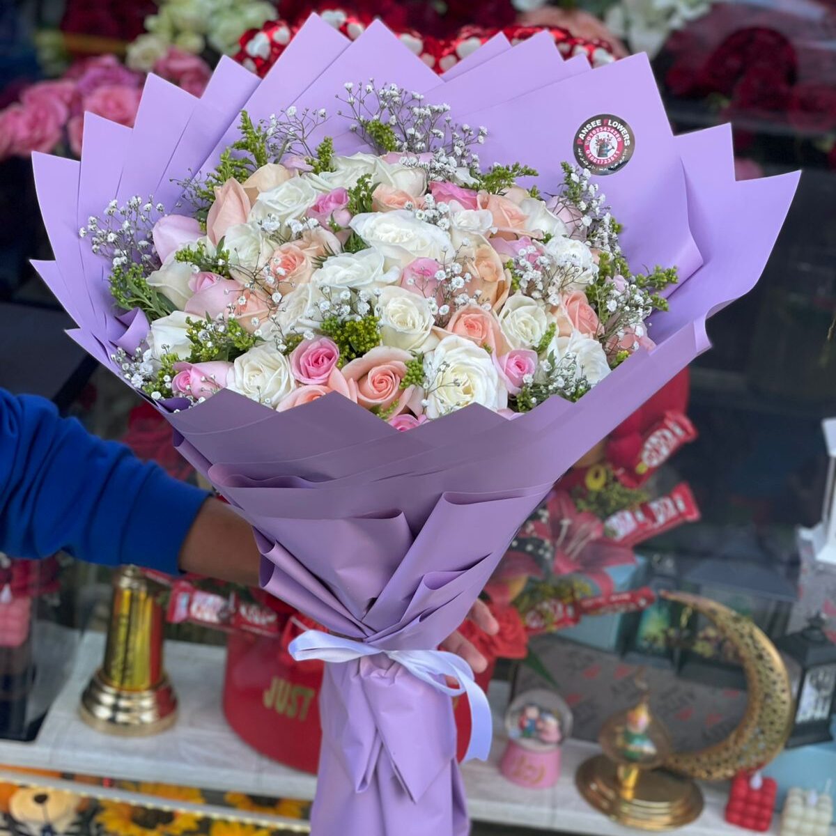 Bouquet of natural white, pink, and peach roses